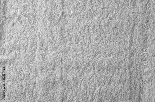 White crumpled textile, terry cloth background and texture