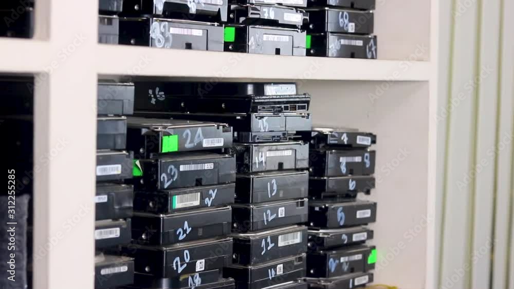 Storing broken hard drives in a shelf at a data recovery center Storing broken hard drives in a shelf at a data recovery center