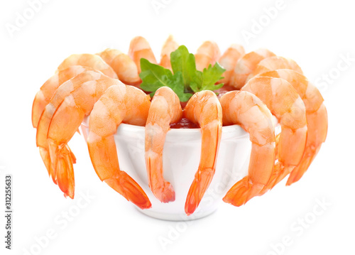 Delicious shrimp cocktail with tomato sauce isolated on white
