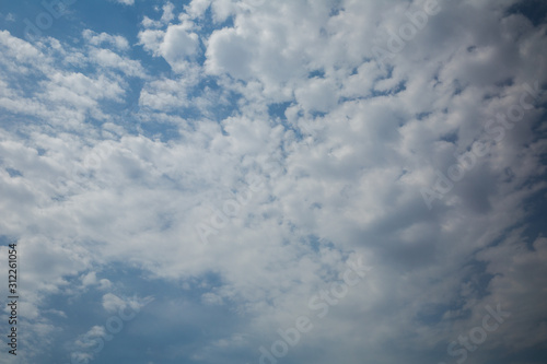 Fototapeta Naklejka Na Ścianę i Meble -  Blue sky and clouds background material. Blue sky with white clouds.blue sky with cloud closeup .