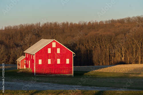 Red Barns and Farm Fields in a Winter Sunset