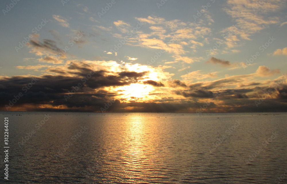 Fototapeta premium Young Christmas sun over the horizon