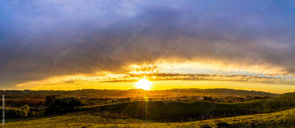 Panoramic Sunset over Green Hills in Country 