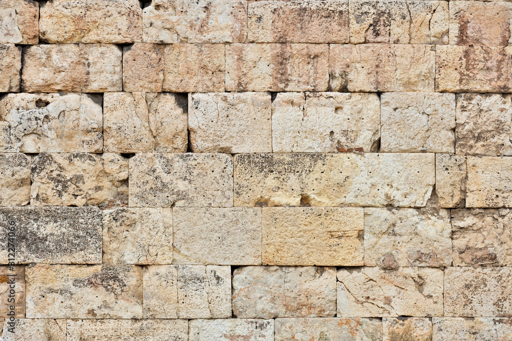 Old stone blocks wall as background Old stone blocks wall as background