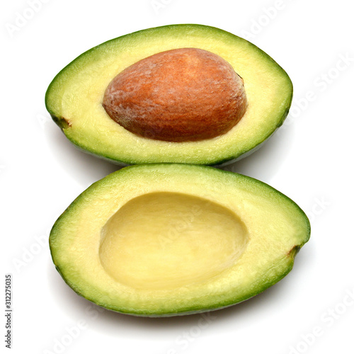 Avocado two halves isolated on a white background. Perfectly retouched, full depth of field on the photo. Creative healthy food concept. Top view, flat lay