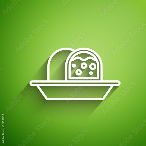 White line Marzipan sponge cake icon isolated on green background. Merry Christmas and Happy New Year. Vector Illustration