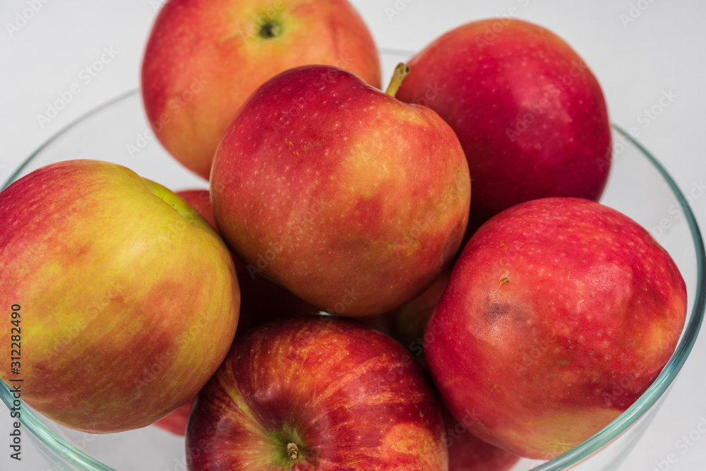 Apples in a glass bowl. Apples in a glass bowl.