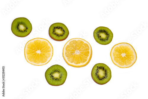 Kiwi and lemon circles on a white background