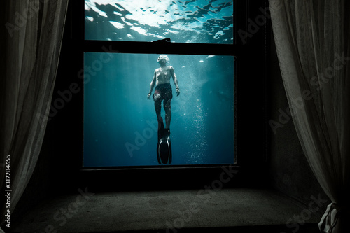 Scuba Diver in Window