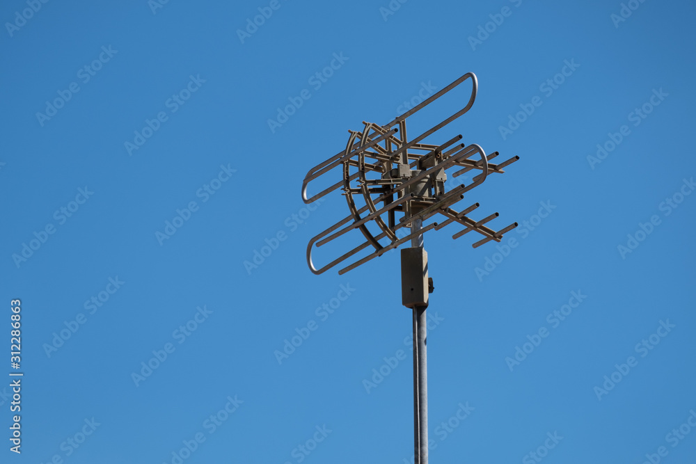Television outdoor antenna and blue sky Television outdoor antenna and blue sky
