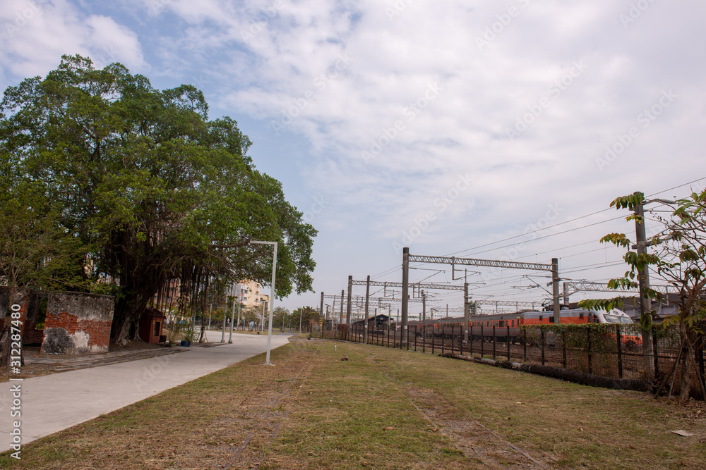 Train passing by railway park