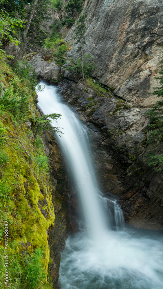 Waterfall flowing In To Pool