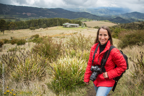 Woman exploring a typical paramo in the department of Cundinamarca in Colombia photo