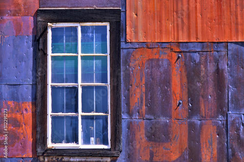 Metal wall and window, Mineola, California photo