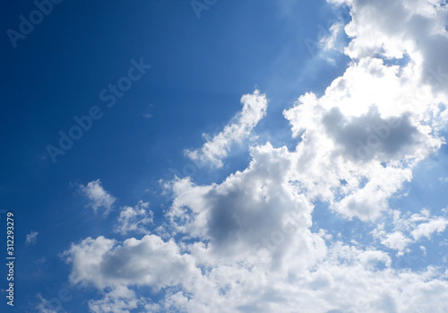 Blue sky clearly background with clouds