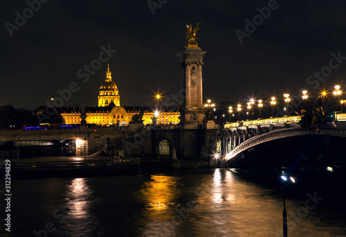 Night view of Seine river and Invalides in Paris  © russieseo