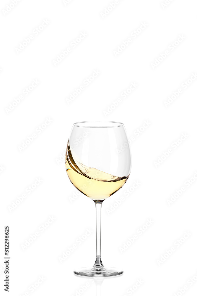 Splash of white wine in a glass isolated on a white background Splash of white wine in a glass isolated on a white background