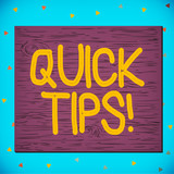 Text sign showing Quick Tips. Business photo text small but particularly useful piece of practical advice Square rectangle unreal cartoon wood wooden nailed stuck on coloured wall