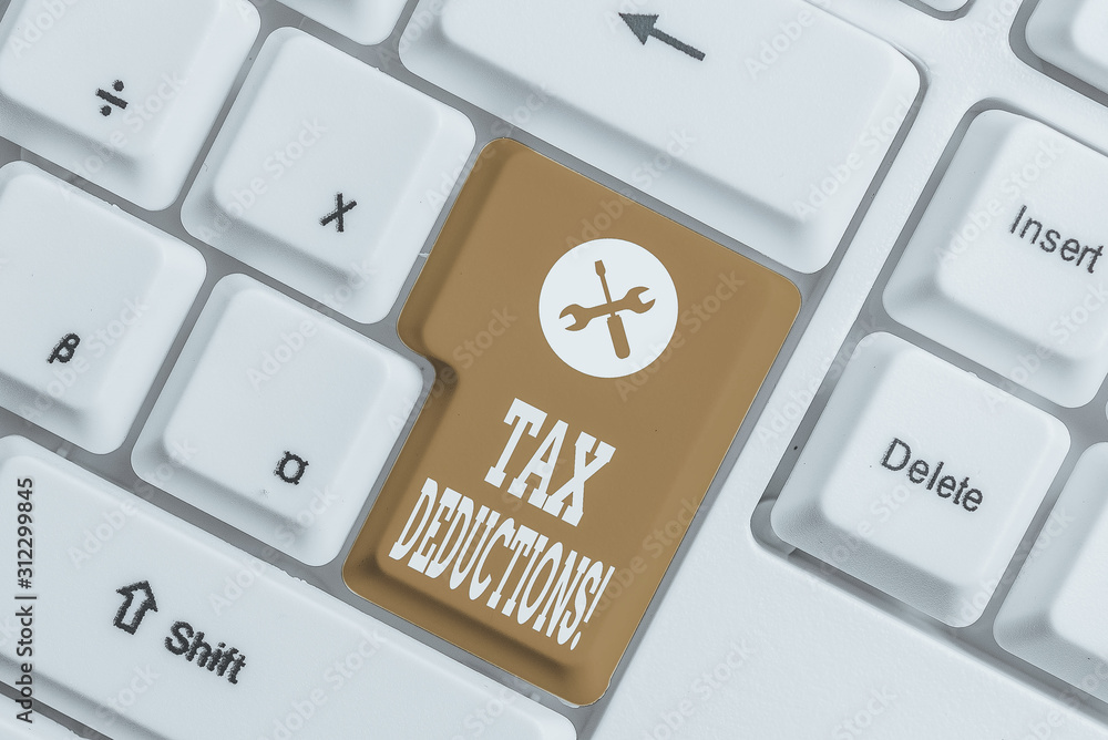 Handwriting text Tax Deductions. Conceptual photo reduction income that is able to be taxed of expenses White pc keyboard with empty note paper above white background key copy space Handwriting text Tax Deductions. Conceptual photo reduction income that is able to be taxed of expenses White pc keyboard with empty note paper above white background key copy space