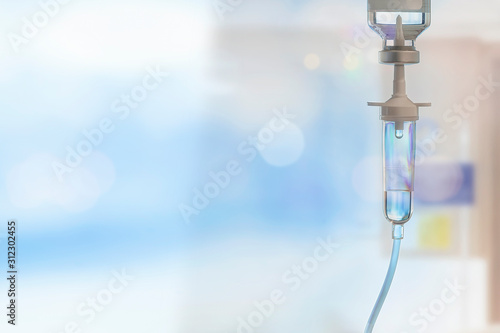 Obraz na płótnie Closeup set iv fluid intravenous drop saline drip hospital, Medical Concept, copy space