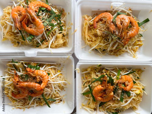 Pad Thai noodles in foam box, Thai food style photo