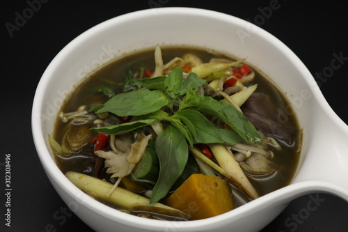 Thai herb soup with mushrooms and pumpkin