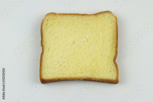 Sliced of yellow bread on white background