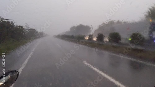 highway driving in heavy rain photo