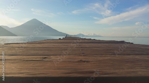  Wooden bridges and boards with a sea and island background