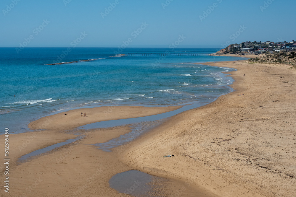 The beautiful Port Noarlunga Beach on a sunny day at low tide in South Australia on 19th November 2019