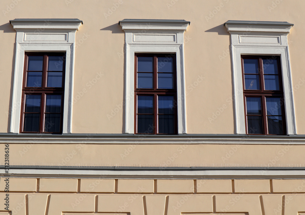 Windows and wall of the reformed college in debrecen city, hungary
