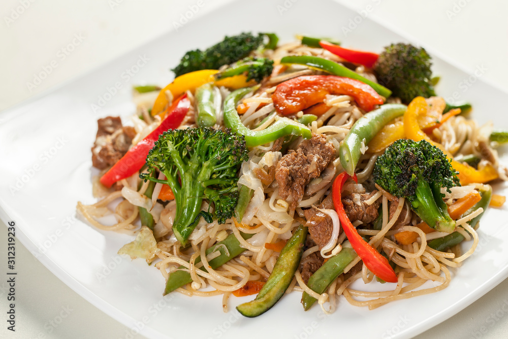 Italian spaghetti with vegetables closeup Italian spaghetti with vegetables closeup