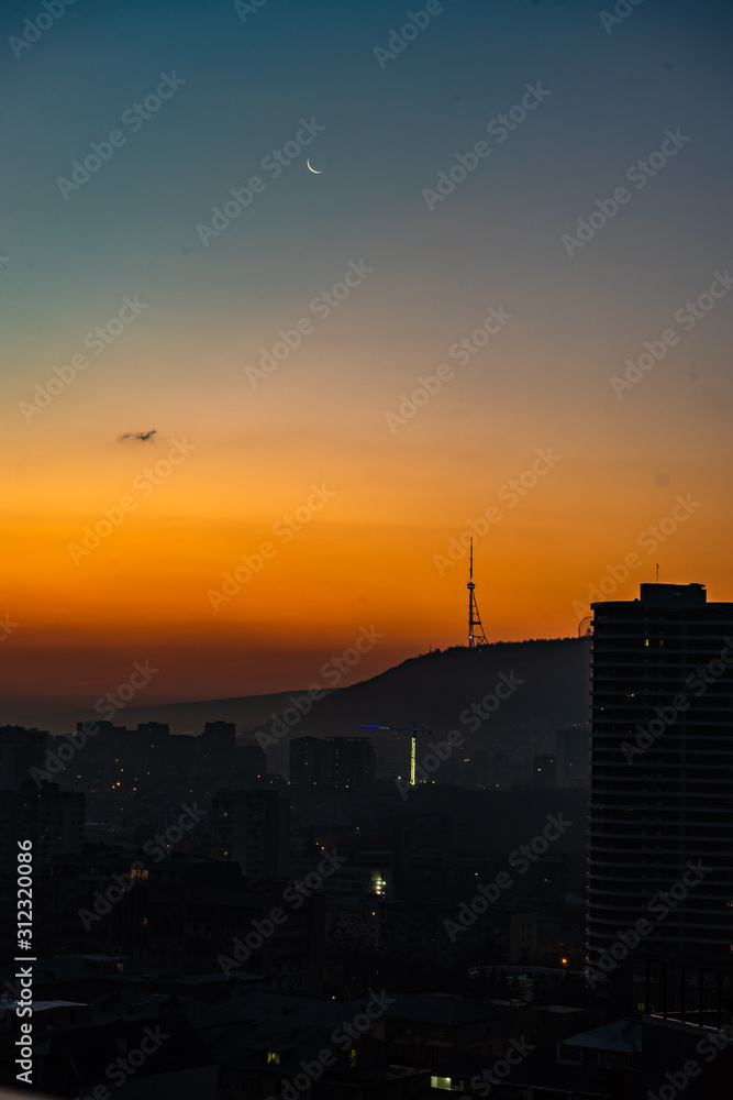 Dramatic sunrise over Tbilisi downtown Dramatic sunrise over Tbilisi downtown