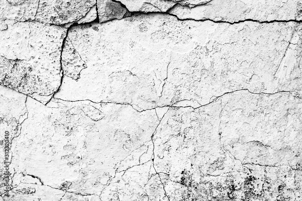 Obraz premium Texture of a concrete wall with cracks and scratches which can be used as a background