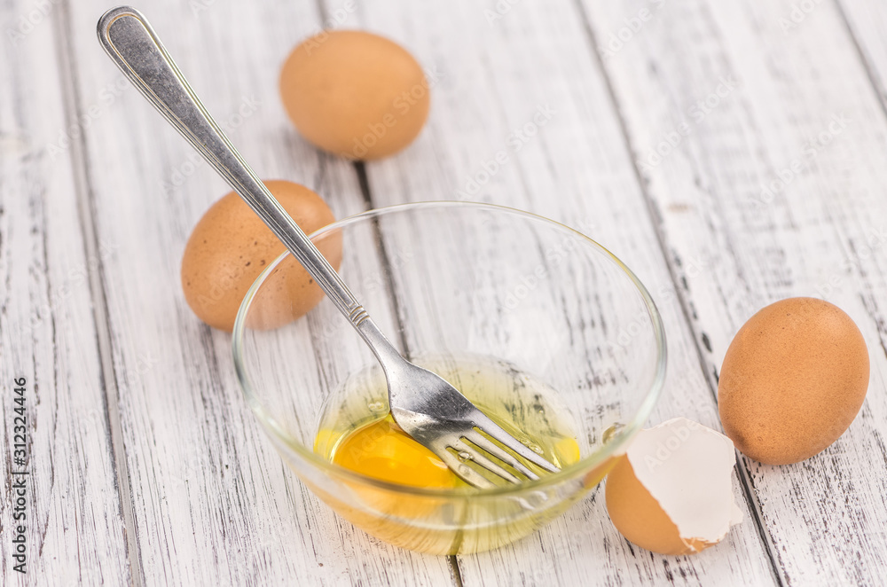 Raw Eggs (selective focus; detailed close-up shot) Raw Eggs (selective focus; detailed close-up shot)