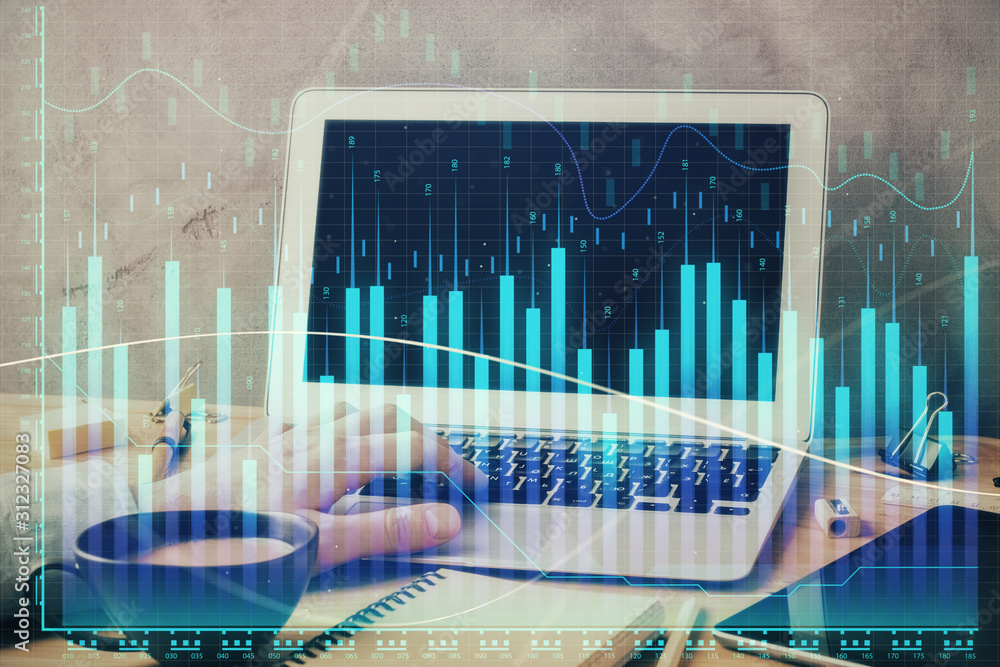 Forex graph with businessman working on computer in office on background. Concept of hardworking. Double exposure. Forex graph with businessman working on computer in office on background. Concept of hardworking. Double exposure.