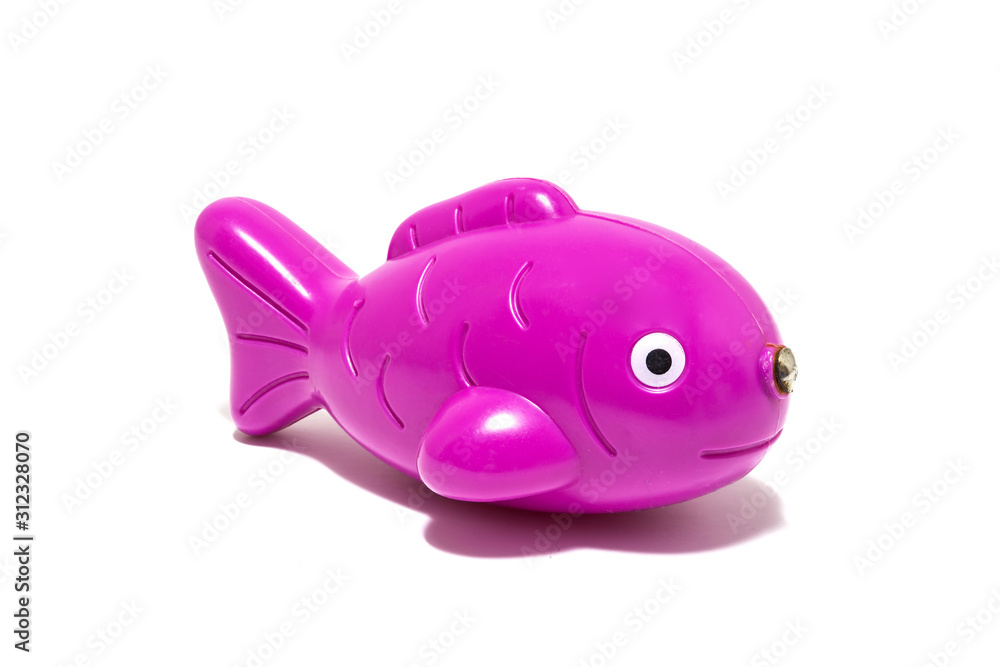 Plastic fish toy isolated on white background. Plastic fish toy isolated on white background.