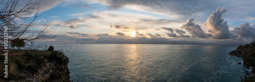 Beatiful panoromic seascape at sunset with dramatic clouds on mediterranean sea  panaroma  of sunset