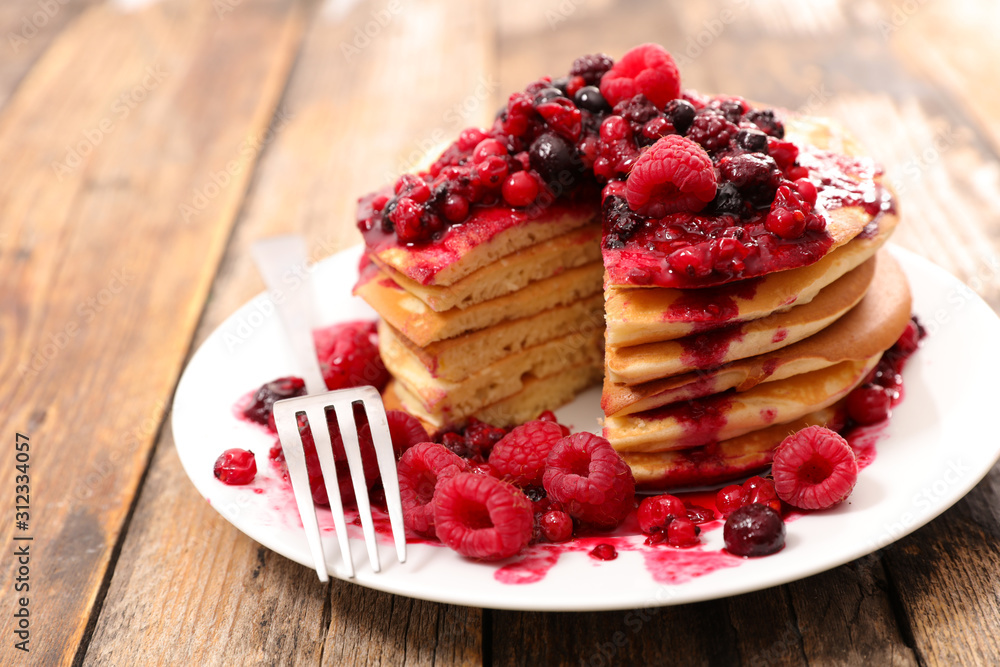 stack of pancake with berry fruit