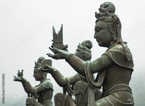ancient statues in the garden of the big buddha. sculptures of goddesses. ancient sculptures