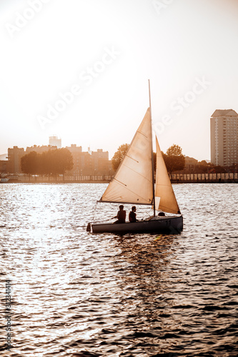 sailing boat in the sea at sunset
