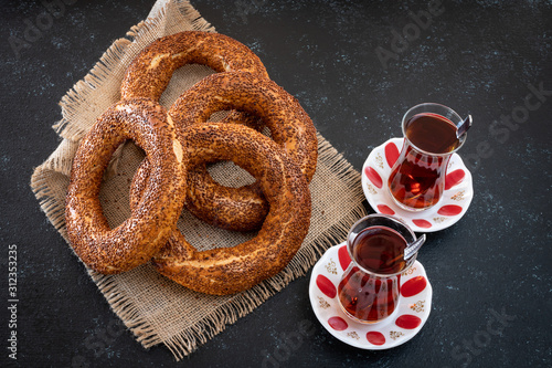 Photography Traditional Turkish bagel simit on the table with black background