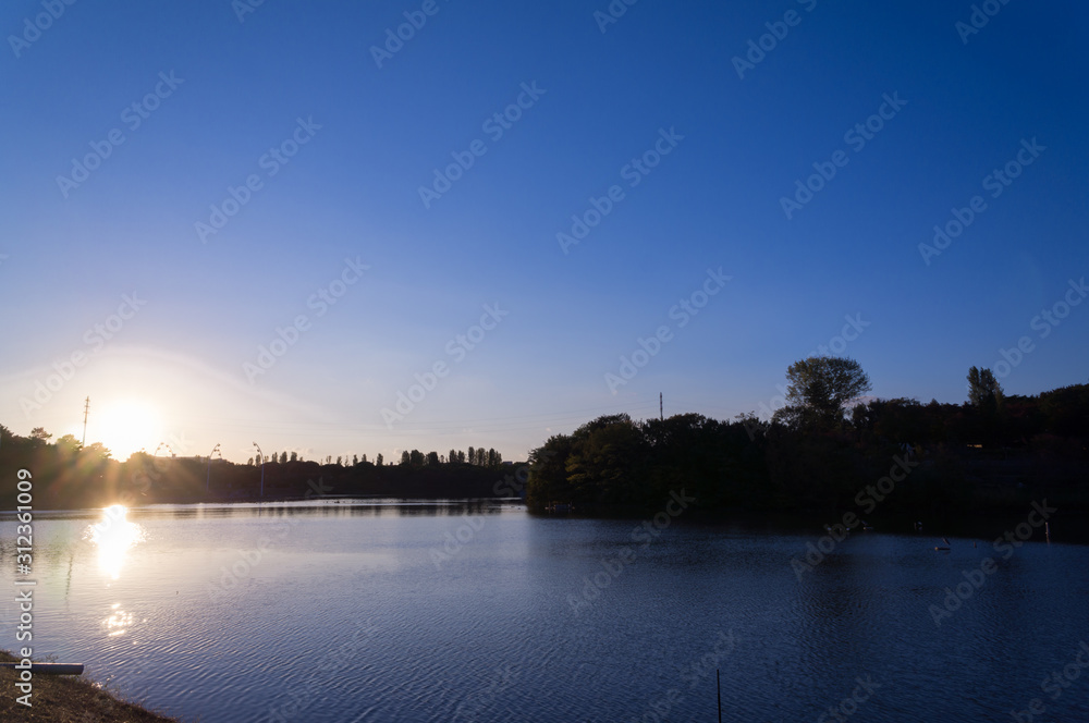 Sunset reflected in the lake, Flower Expo Memorial Tsurumi Ryokuchi Park.