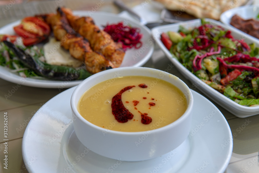 Turkish food dinner with soup and salad Turkish food dinner with soup and salad