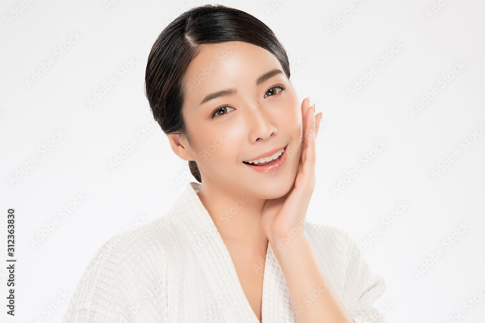 Beautiful Young Asian Woman with Clean Fresh Skin. Face care, Facial treatment, on white background, Beauty and Cosmetics Concept. Beautiful Young Asian Woman with Clean Fresh Skin. Face care, Facial treatment, on white background, Beauty and Cosmetics Concept.