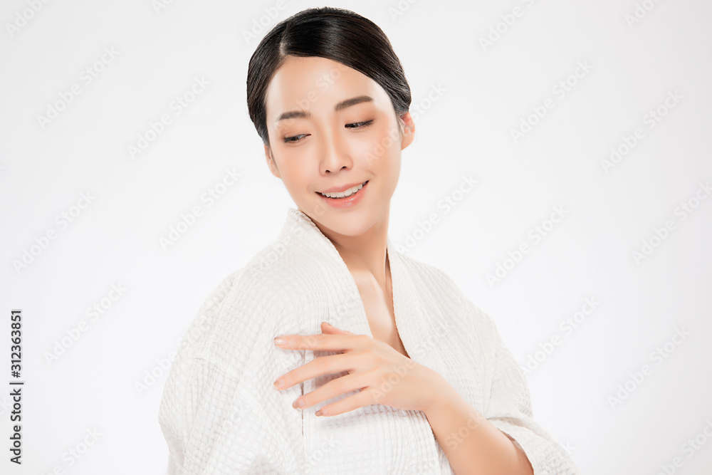 Beautiful Young Asian Woman with Clean Fresh Skin. Face care, Facial treatment, on white background, Beauty and Cosmetics Concept. Beautiful Young Asian Woman with Clean Fresh Skin. Face care, Facial treatment, on white background, Beauty and Cosmetics Concept.