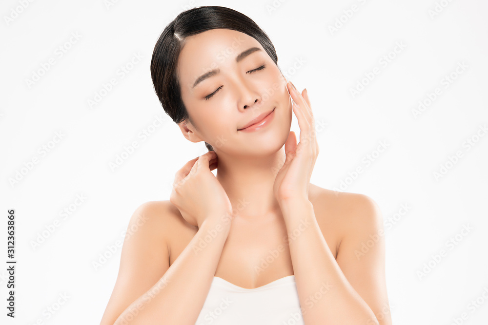 Beautiful Young Asian Woman with Clean Fresh Skin. Face care, Facial treatment, on white background, Beauty and Cosmetics Concept. Beautiful Young Asian Woman with Clean Fresh Skin. Face care, Facial treatment, on white background, Beauty and Cosmetics Concept.