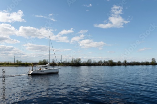 The yacht goes to the White lake from the city of Belozersk. Vologda region