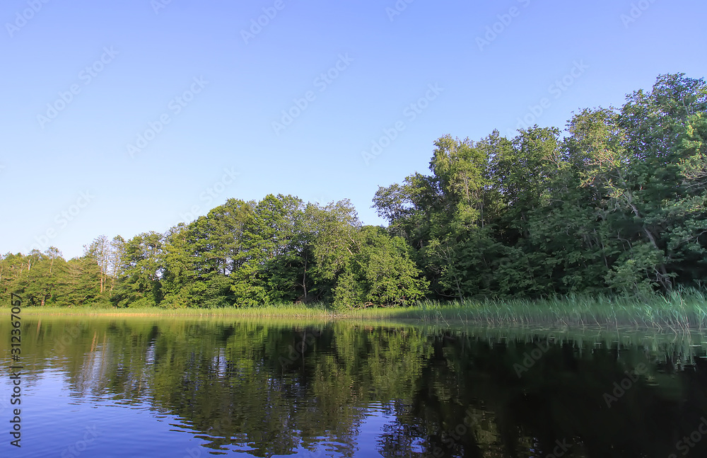 Scenic view to landscape with lake in Latvia, Latgale, East Europe. Summer nature. Scenic view to landscape with lake in Latvia, Latgale, East Europe. Summer nature.