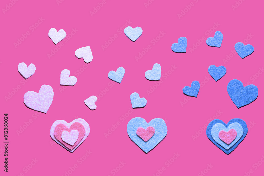 Felt hearts on the pink background. Valentine's card